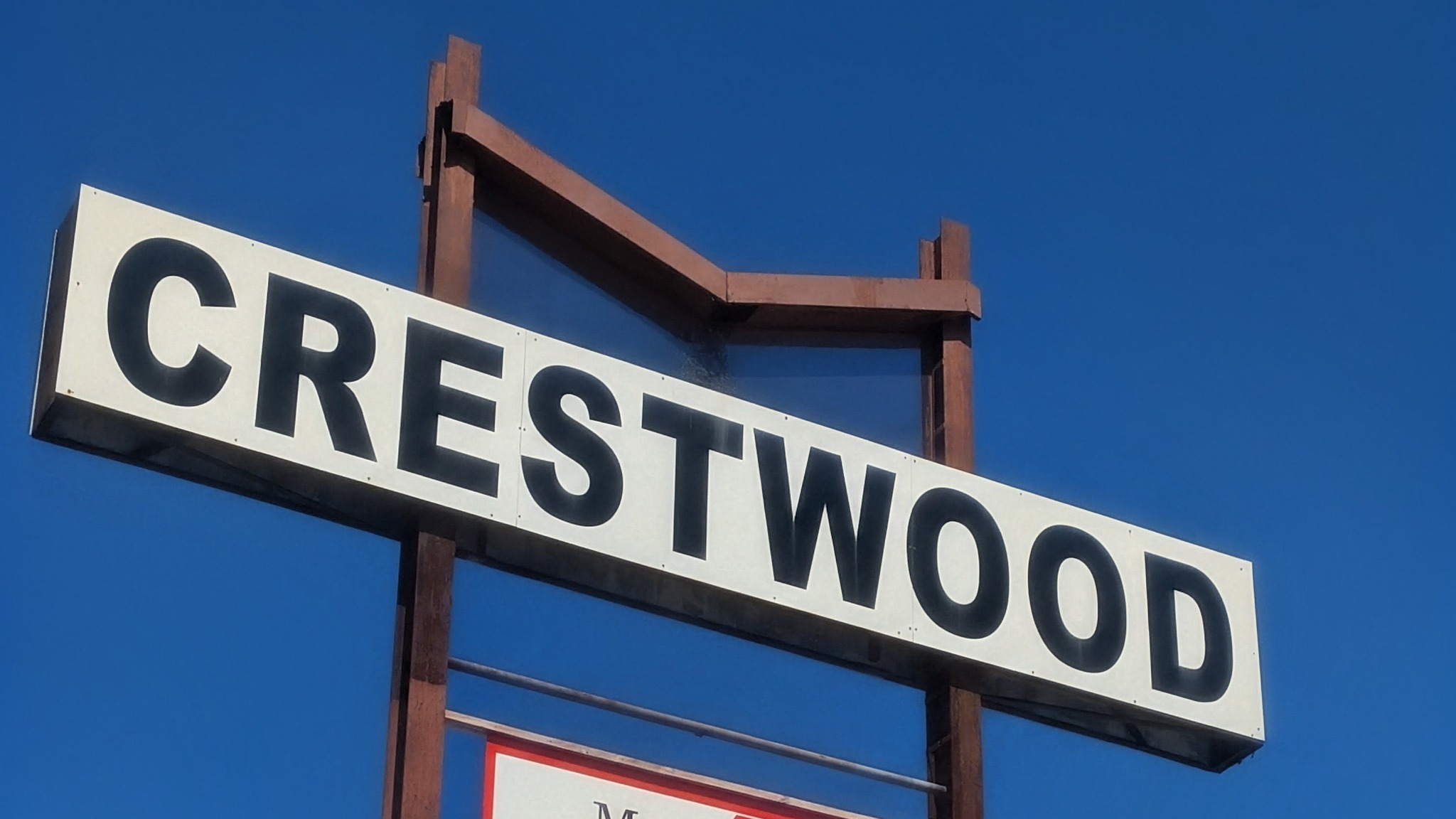 The Crestwood shopping center sign, a landmark when finding Saloon 1904