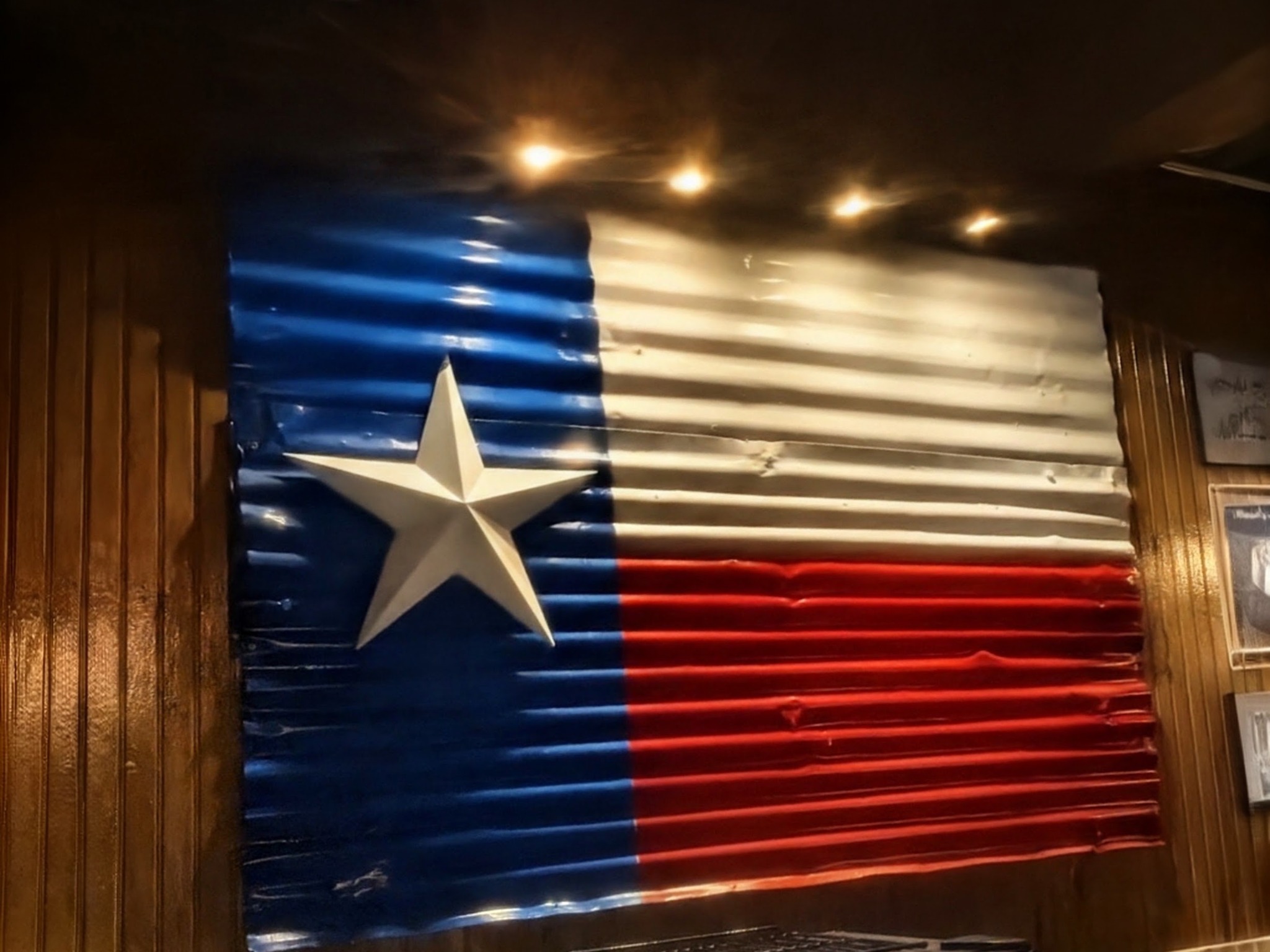 The Texas flag wall art inside Saloon 1904